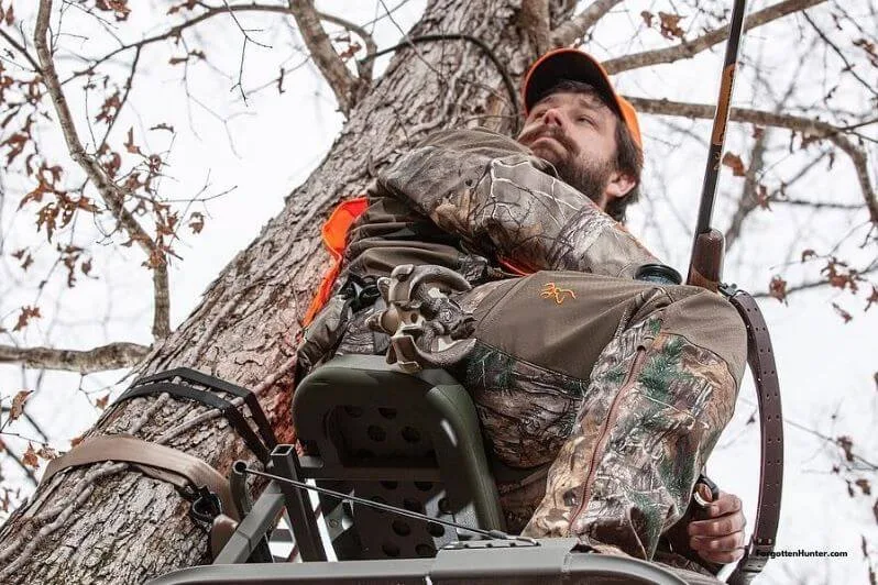 The Best Tree Stands for 2022 (Climbing/Hang On/Ladder) - Buyer's Guide 30 Hunter Sitting in his Tree Stand